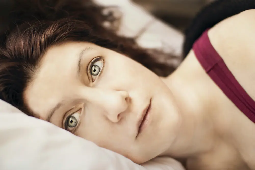Why Do I Keep Waking Up at 3AM During Menopause? (Real Reasons No One Explains)